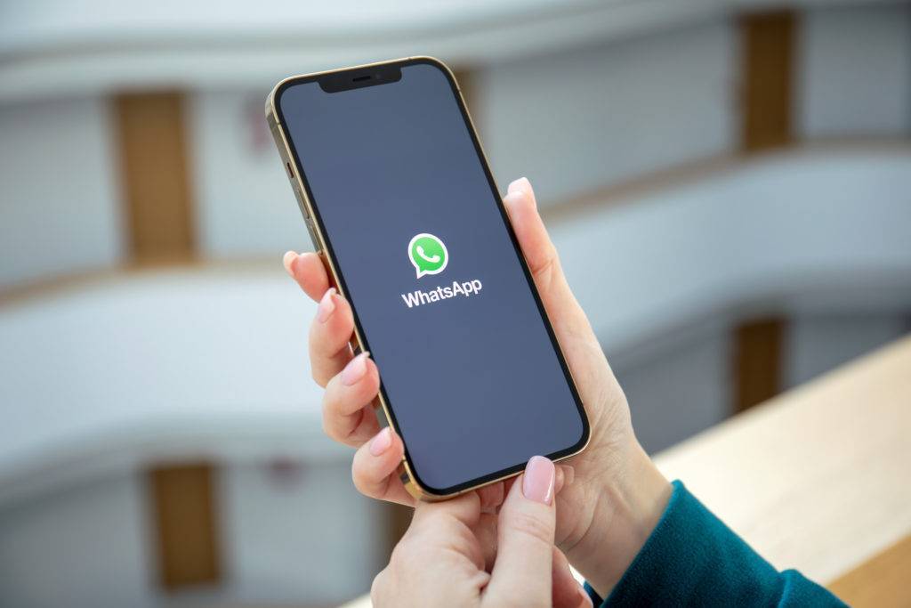 WhatsApp logo on a smartphone